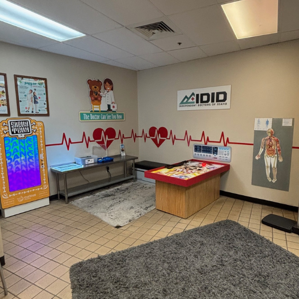 Doctor's office exhibit with giant operation table, Skelly telly, x-rays, and other educational medical toys.