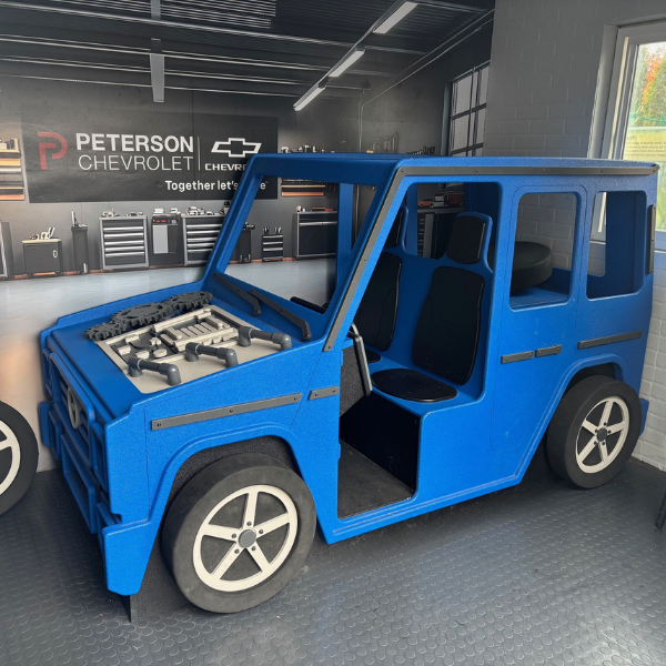 Blue Car in garage that kids can fix up