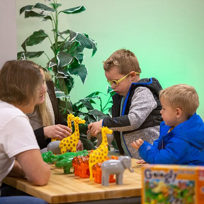 Family playing at a table